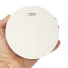 Interconnected smoke alarms - ZEN single smoke alarm being held by a hand