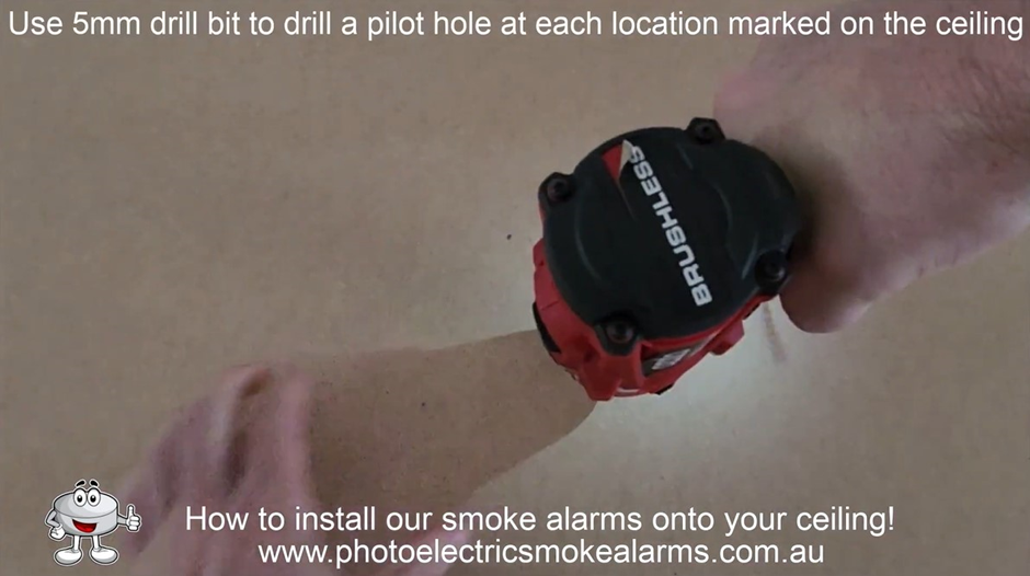 Use a 5mm drill bit to drill two pilot holes into the ceiling for the smoke detector mounting bracket